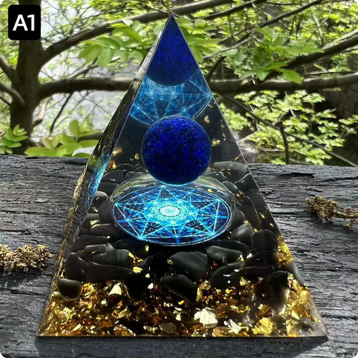 Prisma Calming Energy Pyramid 6CM on wooden surface with nature background.