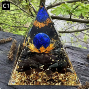 Prisma Calming Energy Pyramid 6CM on wood with nature background.