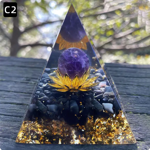 Prisma Calming Energy Pyramid 6CM with purple gemstone and gold accents, ideal for promoting tranquility and relaxation.