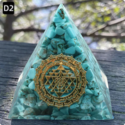 Prisma Calming Energy Pyramid 6CM with crystal stones and decorative design.
