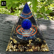 Prisma Calming Energy Pyramid 6CM with crystals on rustic wooden surface.