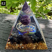 Prisma Calming Energy Pyramid 6CM on wooden surface promoting relaxation and stress reduction.