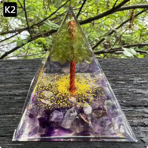 Prisma Calming Energy Pyramid 6CM with crystals, promoting relaxation and reducing stress in tranquil setting.